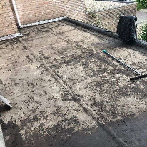 Schoonmaken van een plat dak in Bergschenhoek Schoonmaken van een plat dak in Bergschenhoek